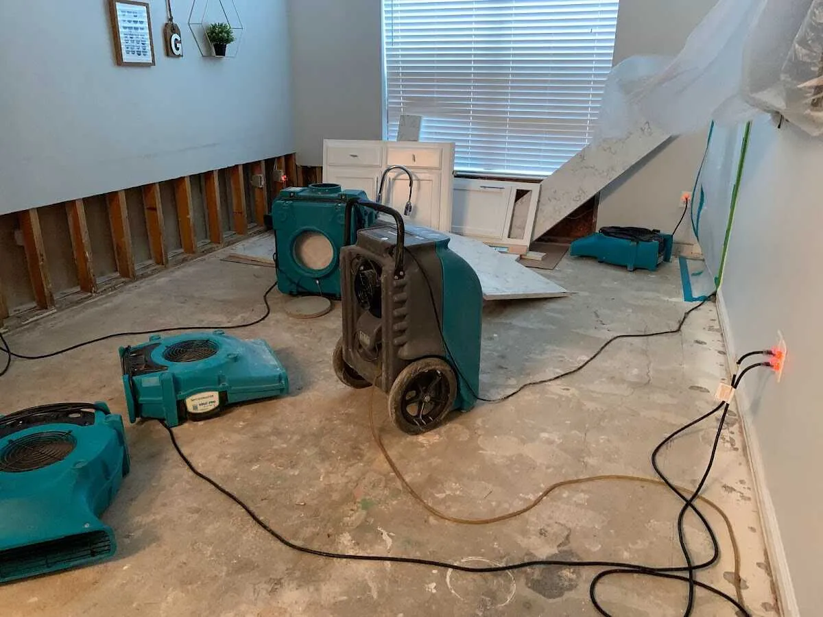 Dehumidifier in flood-cut room for Water Damage Restoration in Arden-Arcade